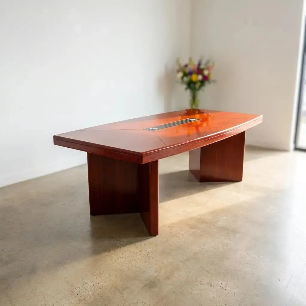 Premium 2.4m mahogany conference table with high-gloss finish and built-in cable management grommets, designed for professional boardrooms and executive meeting rooms.