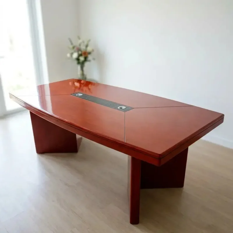 Premium 2.4m mahogany conference table with high-gloss finish and built-in cable management grommets, designed for professional boardrooms and executive meeting rooms.