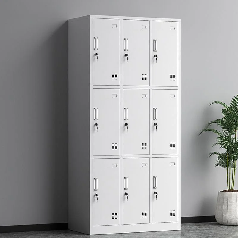 9-locker steel filing cabinet in a clean light grey finish, featuring a three-by-three grid configuration of individual lockable storage compartments, each equipped with a recessed handle, key lock, and lower ventilation slots.