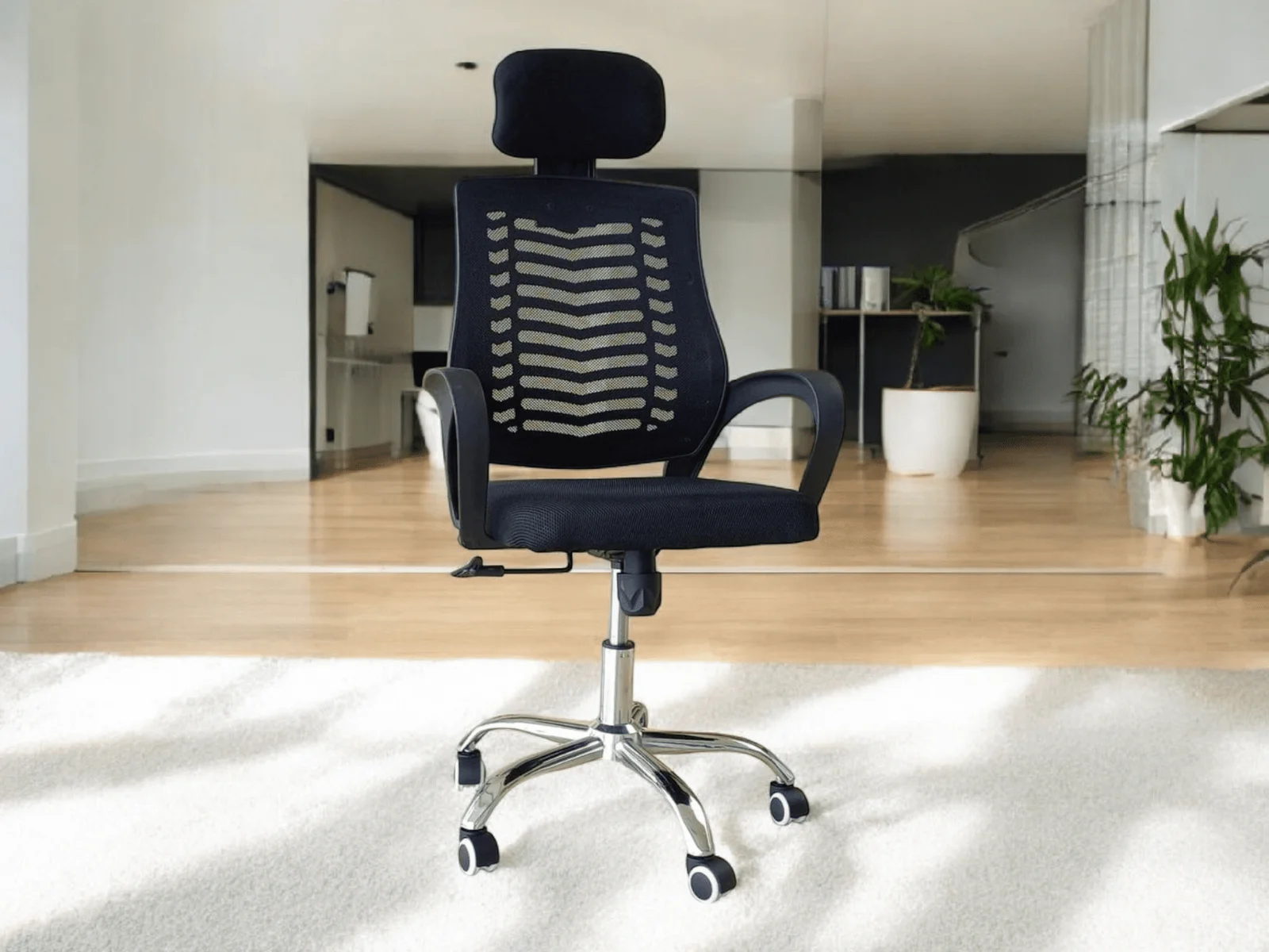 High-back ergonomic mesh office chair with adjustable headrest, chrome swivel base, and lumbar support.
