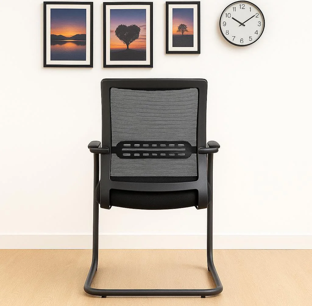 Mid-back mesh waiting chair featuring a rectangular black mesh backrest with a perforated horizontal lumbar support band, fixed curved armrests, a padded black fabric seat, and a black metal cantilever sled base.