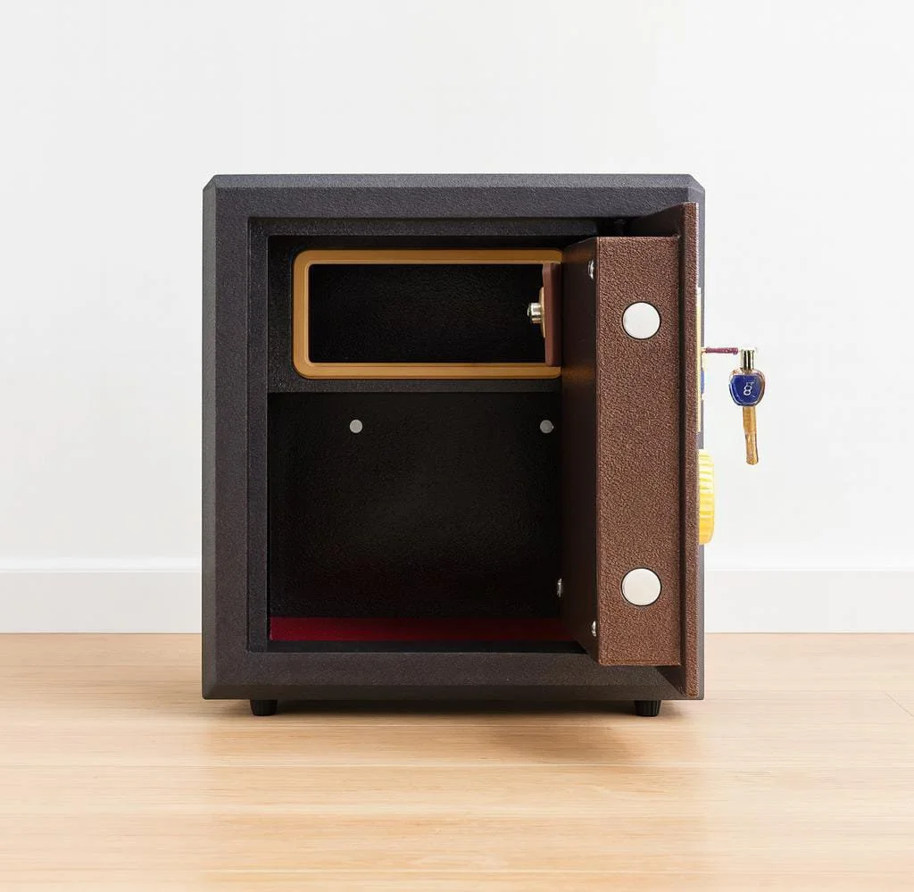 50kg fireproof safe with a heavy-duty dark brown steel casing, featuring a slightly open light brown door, an electronic digital keypad with an LCD display, a master key override lock, an emergency power key, and a gold-trimmed handle.