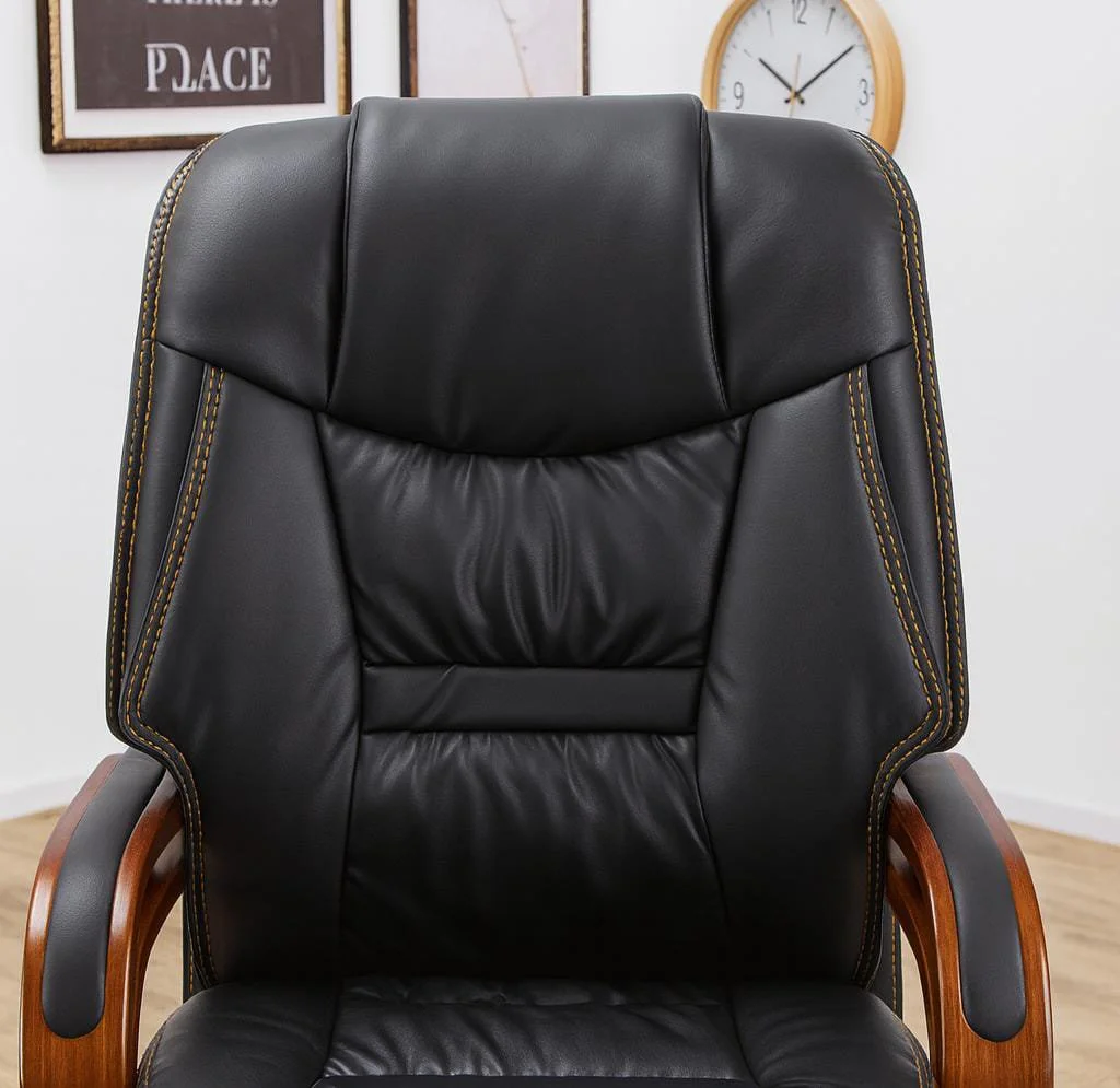 High back executive leather office chair with mahogany wood base and ergonomic padded headrest.