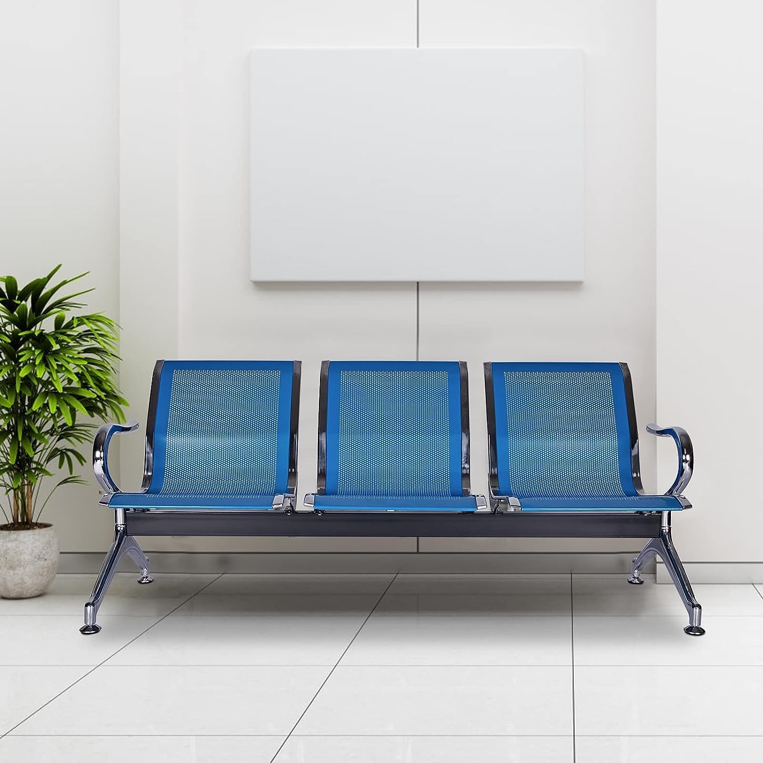 3-link blue waiting bench featuring three contoured seats made from perforated blue steel, accented by polished chrome borders, curved chrome armrests, a heavy-duty black steel support beam, and angled chrome legs with adjustable leveling feet.