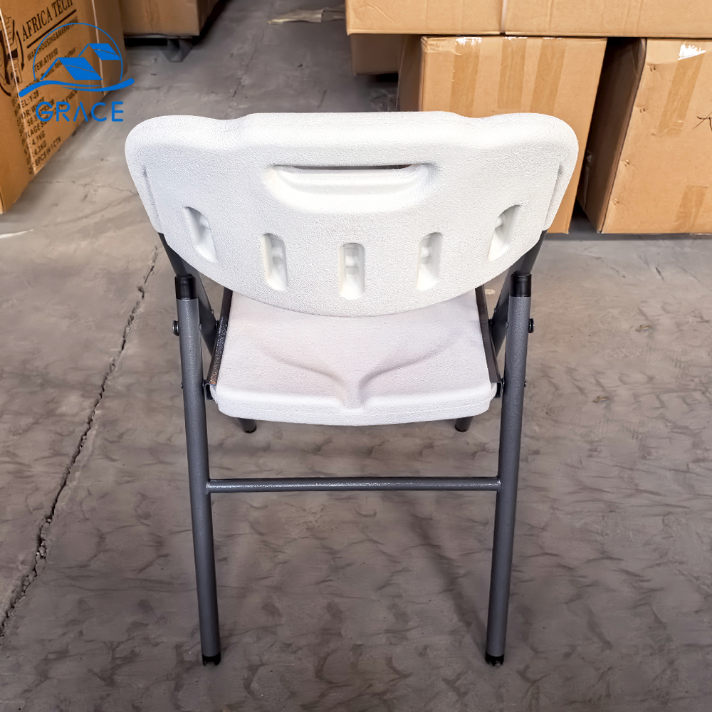 White foldable office chair featuring a contoured molded plastic backrest with a built-in handle, a textured white plastic seat, and a durable grey powder-coated steel folding frame.