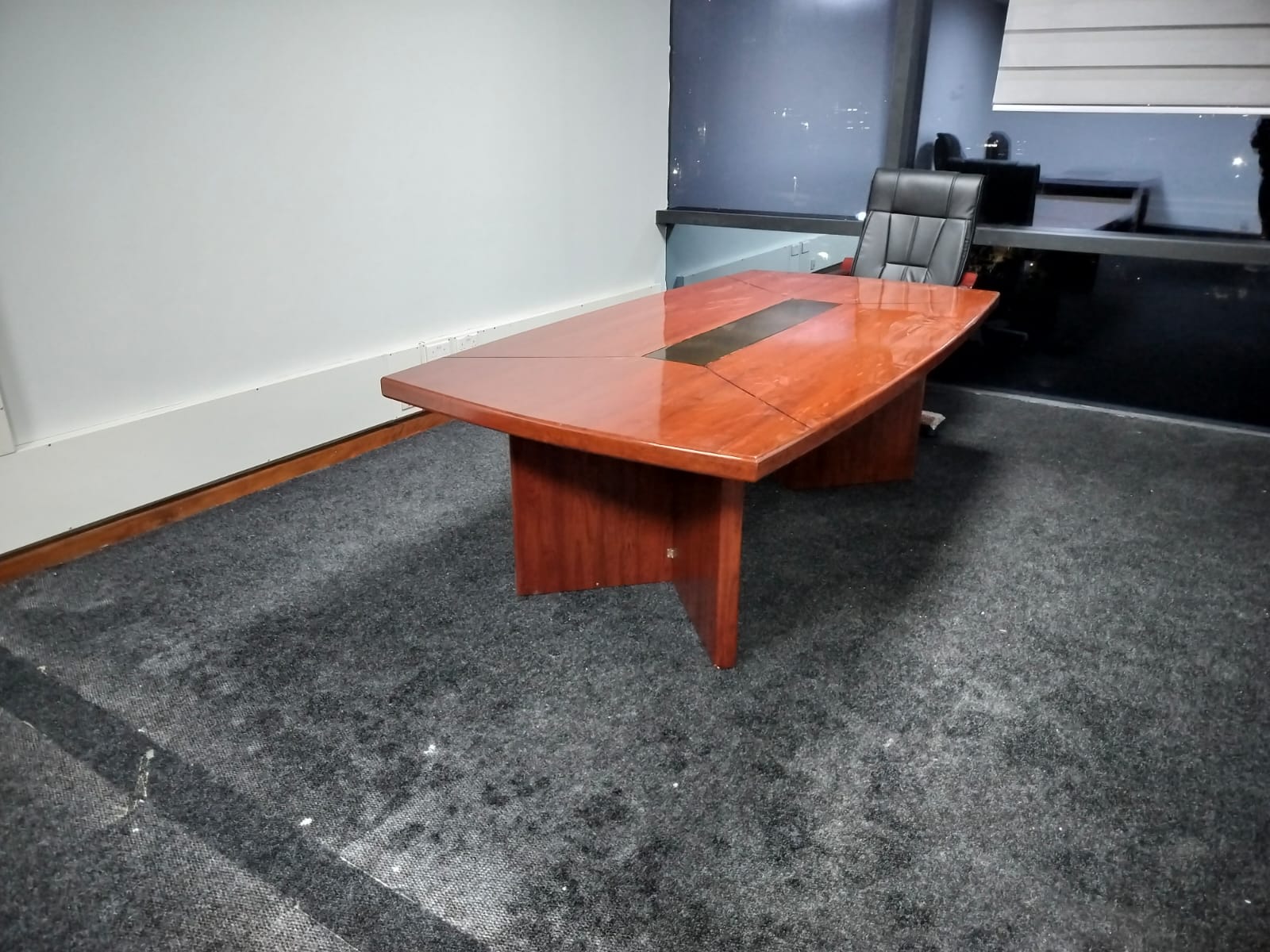 2.4m modern mahogany conference table with rectangular wood top, black cable management inlay, and slab base.