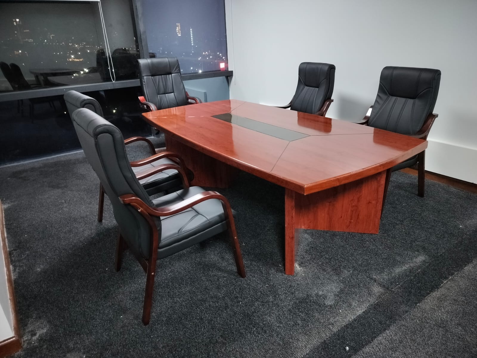 2.4m modern mahogany conference table with rectangular wood top, black cable management inlay, and slab base.