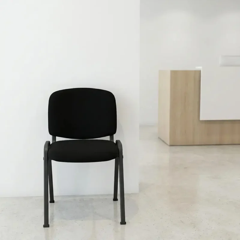 Black padded stacking chair with ergonomic fabric seat and durable metal frame, ideal for conference rooms, waiting areas, or office guest seating.