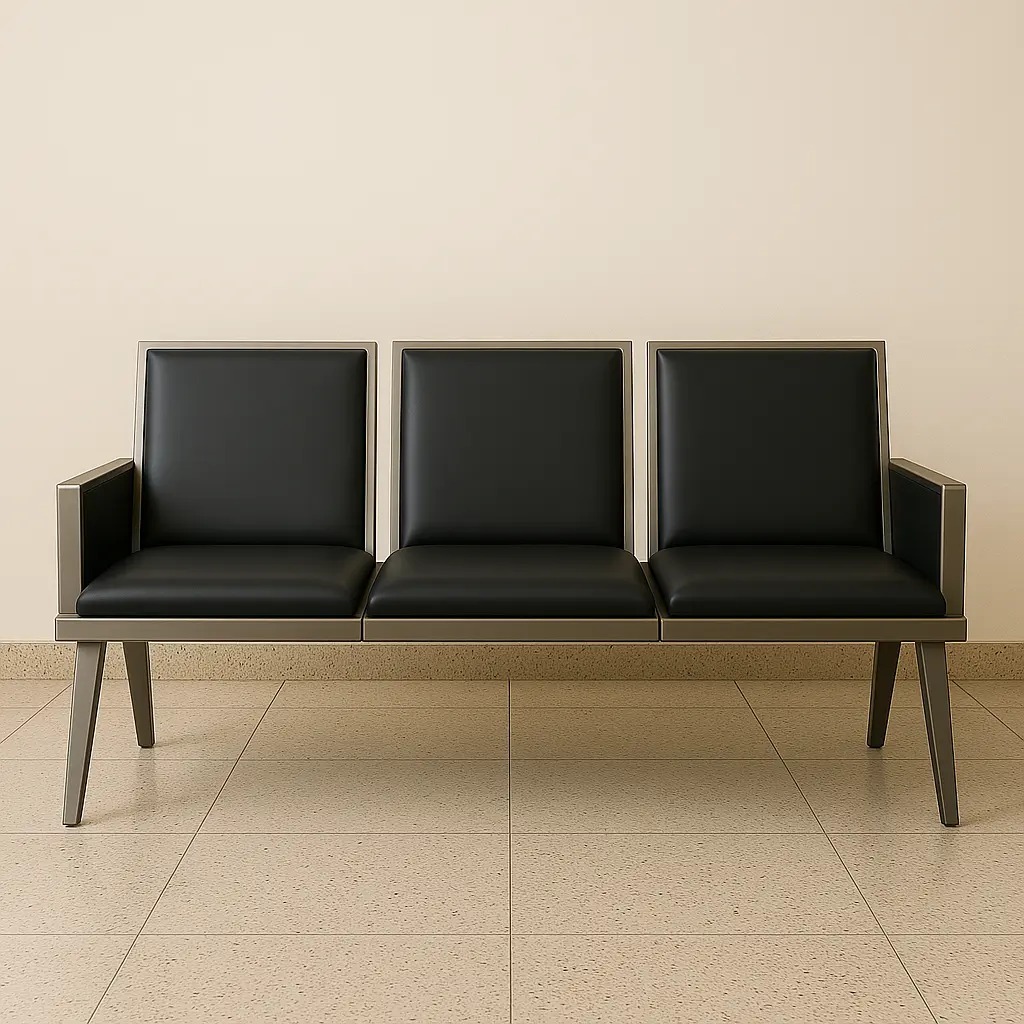 Modern 3-seater reception bench with black leather padded seats and a sturdy silver metal frame, designed for professional waiting rooms and office lobbies.