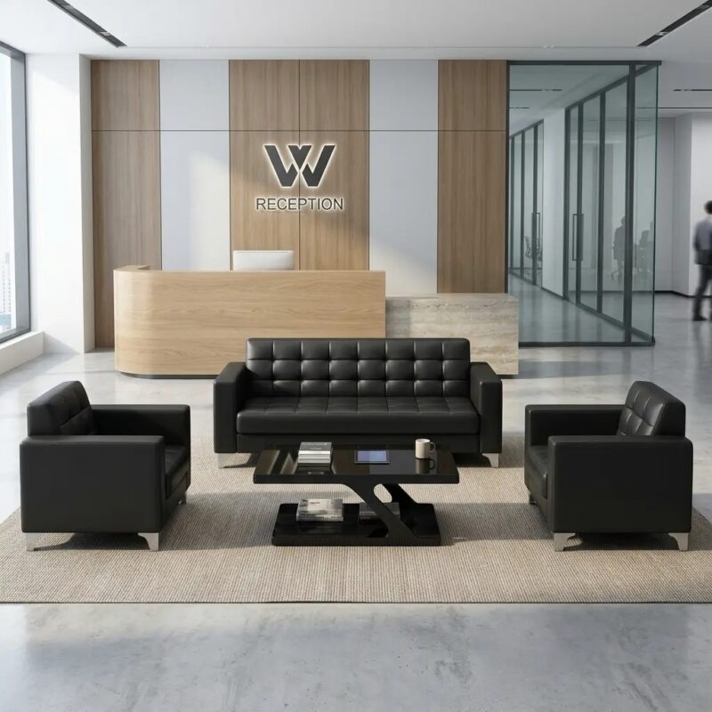 Premium 5-seater office sofa set in black leather featuring a 3-seater couch and two matching single-armchair seats with checkered tufted upholstery, paired with a modern black high-gloss coffee table on chrome legs.
