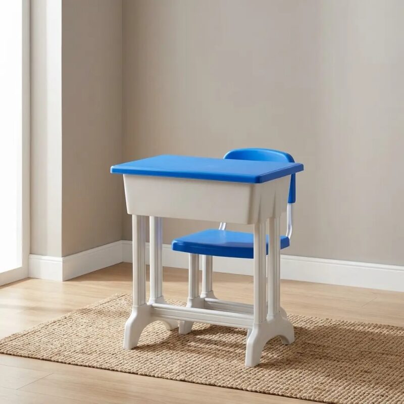 Blue kids study desk and chair set featuring an ergonomic blue plastic chair, a vibrant blue tabletop with a white storage book box underneath, and durable white molded legs.