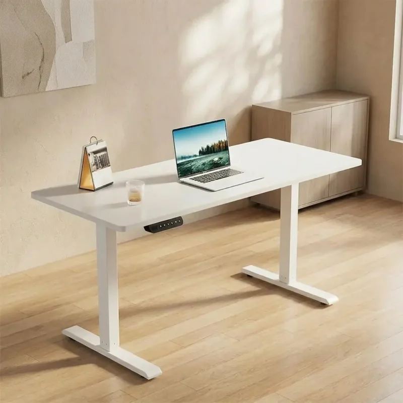 1.4m white height adjustable standing desk for home offices with electric lift system and modern minimalist T-frame.