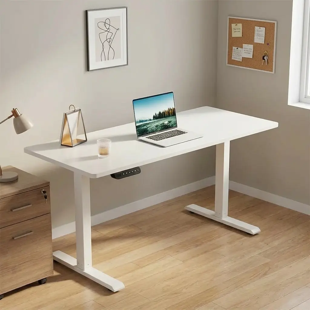 1.4m white height adjustable standing desk for home offices with electric lift system and modern minimalist T-frame.