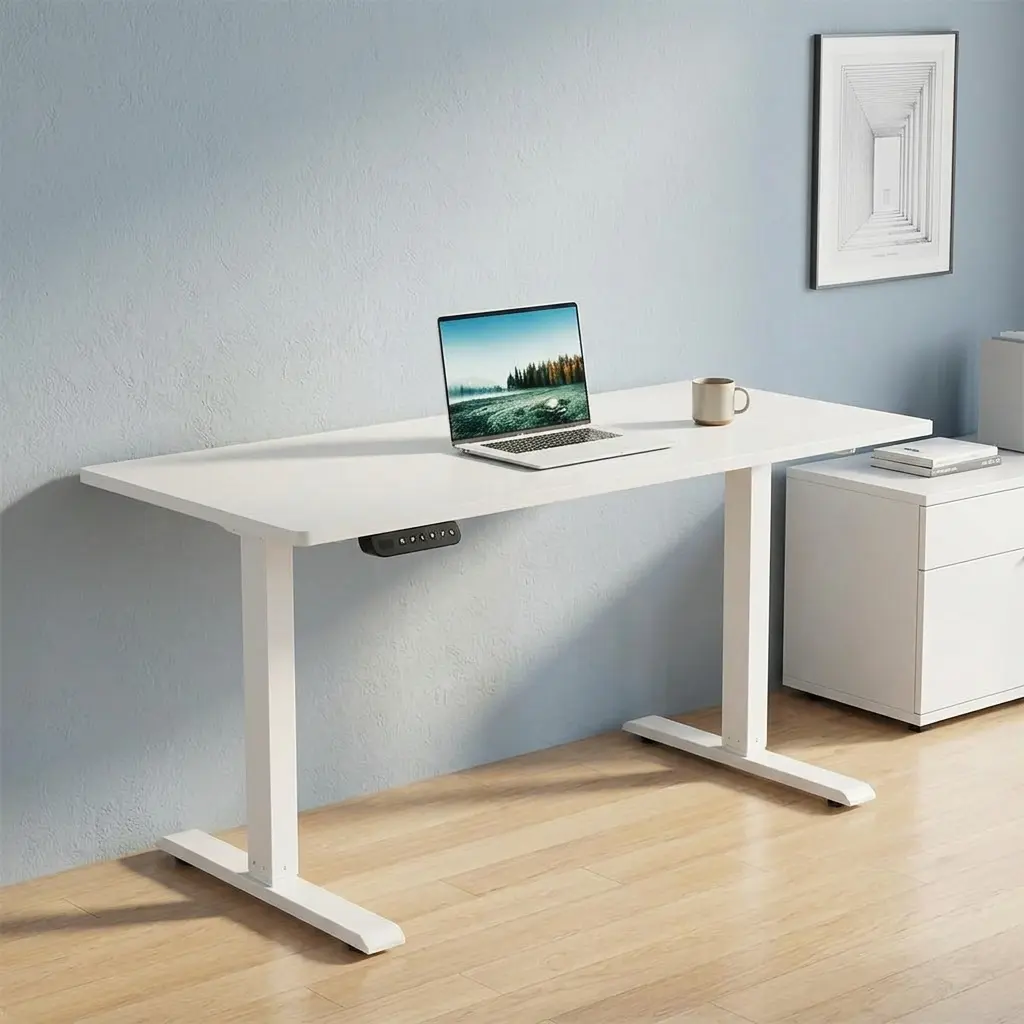 1.4m white height adjustable standing desk for home offices with electric lift system and modern minimalist T-frame.