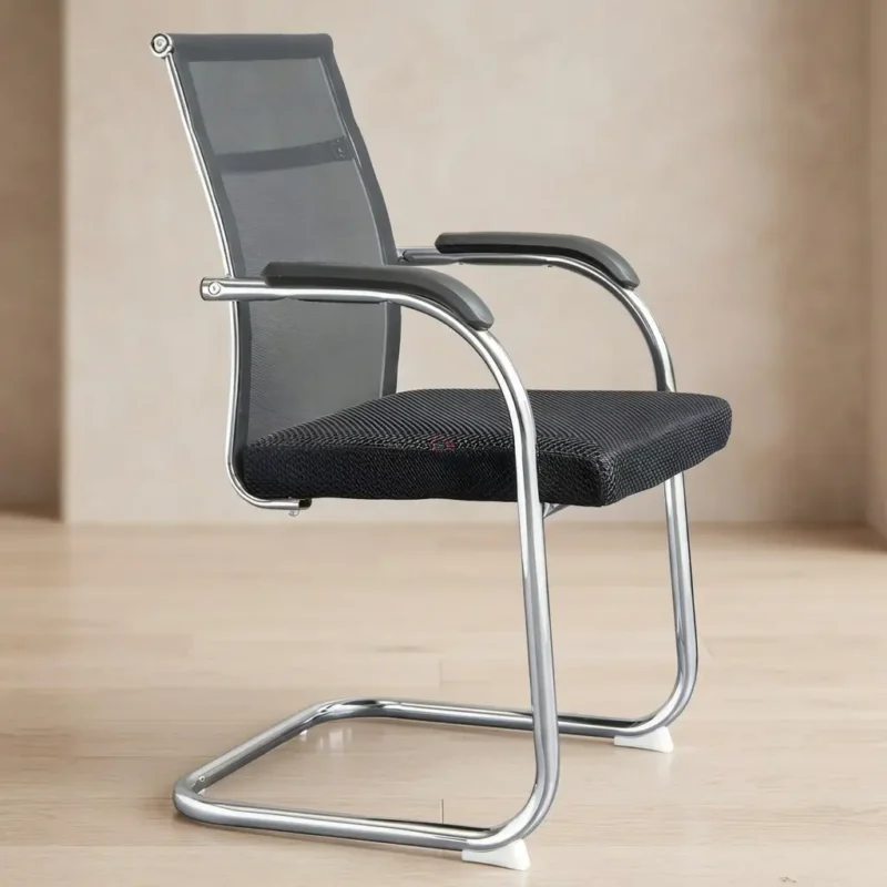 Modern mesh office waiting chair featuring a breathable black mesh backrest, patterned fabric cushion seat, curved chrome armrests with black padding, and a chrome cantilever sled base.