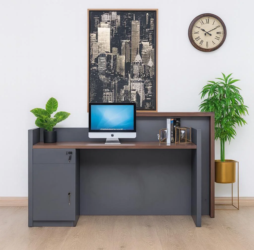 1800mm reception office desk featuring a dual-level design with a matte dark grey chassis, a medium-toned wood grain transaction counter, an integrated writing desktop with a rectangular grommet, and a built-in left pedestal storage unit comprising a lockable drawer and an open cabinet door revealing an interior shelf.