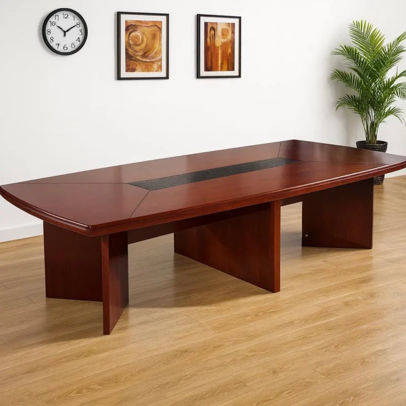Large 3.5m boat-shaped conference table in a rich cherry wood veneer finish, featuring a paneled tabletop design with a central black wire management flip-top grommet rail and three sturdy V-shaped slab legs.