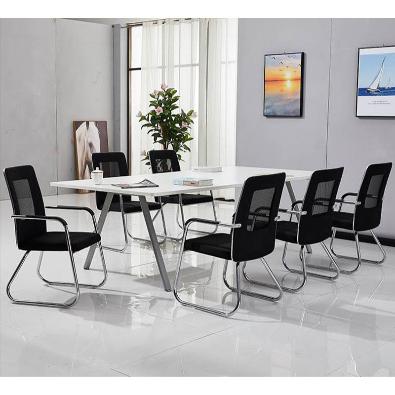 Mid back mesh visitor seat featuring a rectangular black mesh backrest with a semi-transparent center panel, a thick contoured black fabric padded seat cushion, sloped chrome armrests with black polymer arm pads, and a polished chrome tubular metal cantilever sled base equipped with clear floor glides.