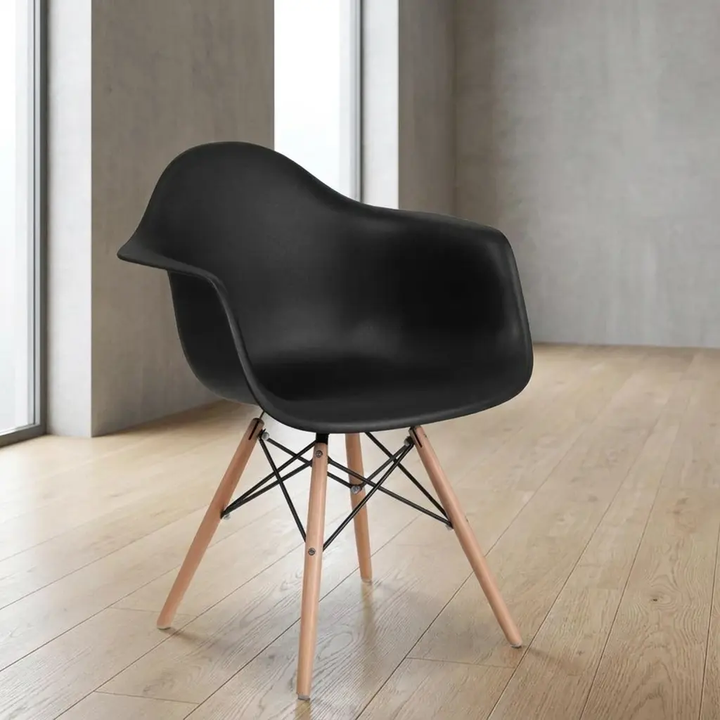 Eames Bistro Modern Plastic Chair featuring a molded black polypropylene single-piece shell seat with integrated curved armrests, supported by a wooden dowel leg base reinforced with an intricate black metal Eiffel tower wire cross-bracing.