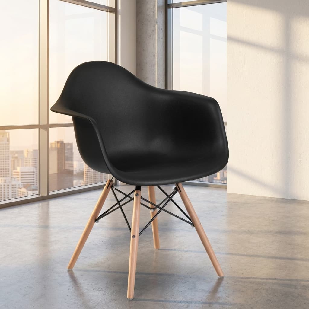 Eames Bistro Modern Plastic Chair featuring a molded black polypropylene single-piece shell seat with integrated curved armrests, supported by a wooden dowel leg base reinforced with an intricate black metal Eiffel tower wire cross-bracing.