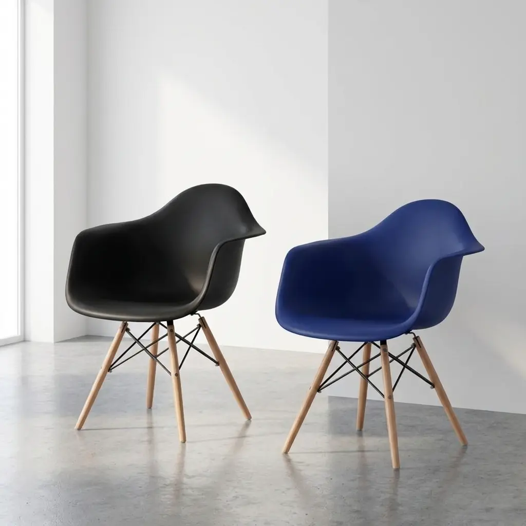Eames Bistro Modern Plastic Chair featuring a molded black polypropylene single-piece shell seat with integrated curved armrests, supported by a wooden dowel leg base reinforced with an intricate black metal Eiffel tower wire cross-bracing.