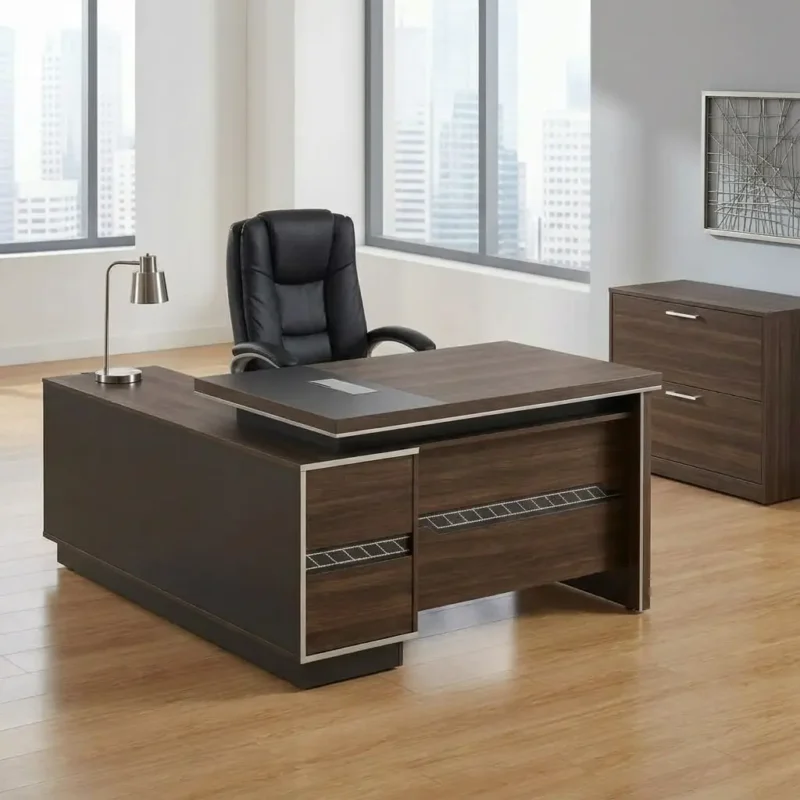 Modern 180cm L-shaped executive office desk in a dark walnut wood finish, featuring an integrated black writing blotter inlay with a silver cable management flip-top, a matching side return cabinet, and decorative textured metallic trim.