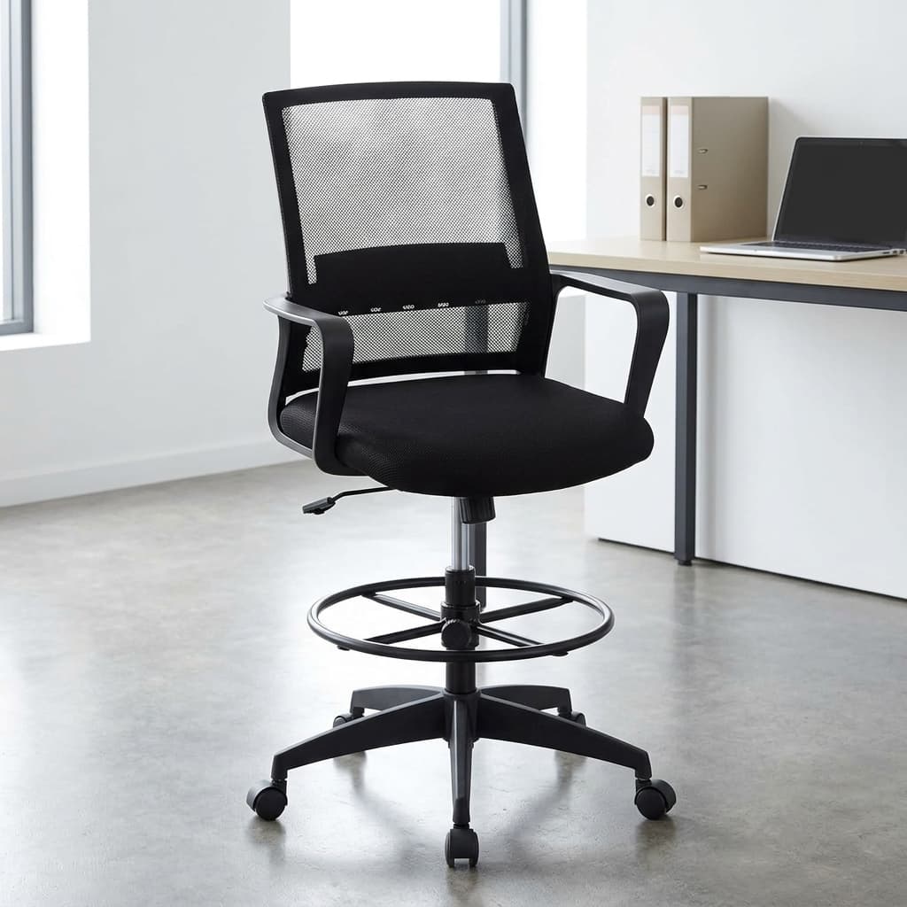Mesh cashier chair with footrest featuring a breathable black mesh mid-backrest with a built-in horizontal lumbar support band, fixed black polymer loop armrests, a contoured black fabric padded seat cushion, an adjustable pneumatic chrome gas lift cylinder equipped with a circular black metal foot ring, and a five-star black nylon base on dual-wheel swivel casters.