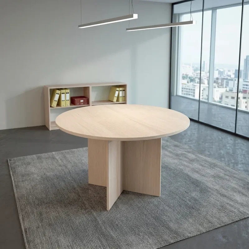 Modern 120cm round conference table featuring a rich cherry wood veneer tabletop with an integrated black circular cable grommet and a sturdy X-shaped slab base.