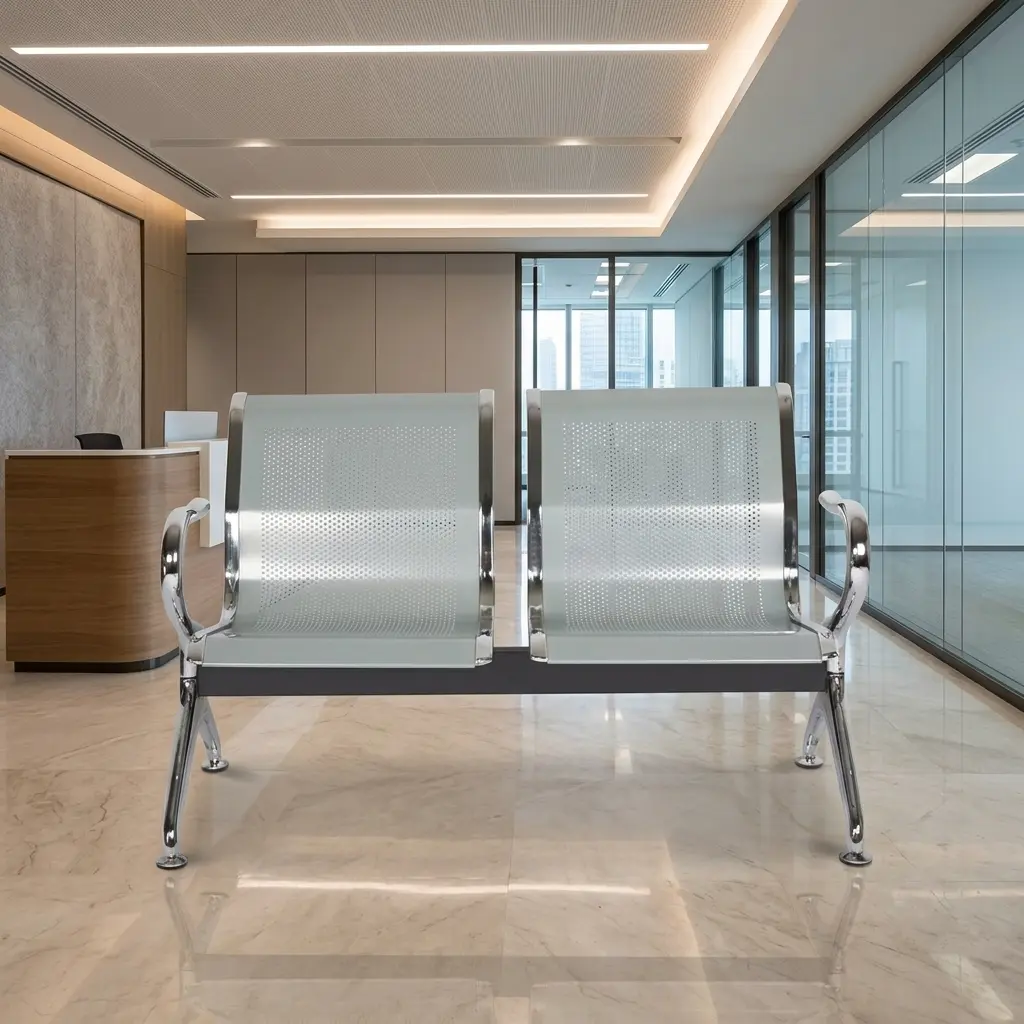 2-seater steel waiting bench featuring two contoured light grey perforated metal seats with polished chrome borders, an underlying black metal horizontal support beam, and curved chrome armrests matching the angled chrome legs with adjustable leveling feet.