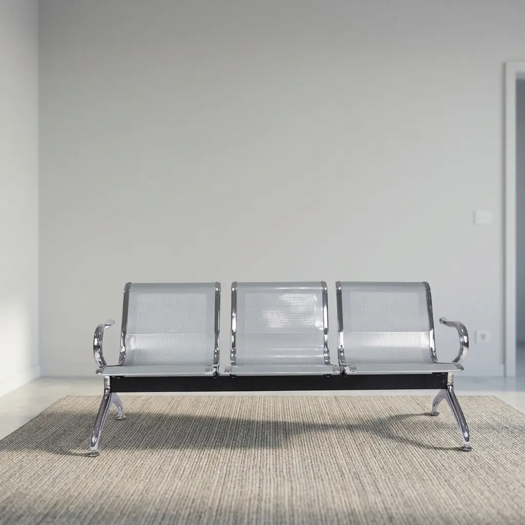 Non-padded steel waiting bench featuring three perforated metallic seats with contoured backrests, curved chrome armrests, a heavy-duty black crossbar beam, and chrome-finished angled legs.