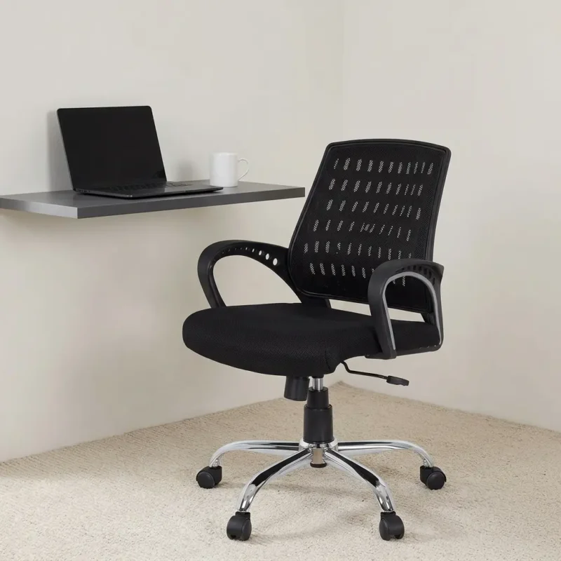 Mesh medium back office chair featuring a breathable black mesh backrest with patterned ventilation cutouts, a thickly padded black fabric seat cushion, curved fixed loop armrests with circular cutout details, pneumatic height adjustment lever, and a sturdy polished chrome five-star base with smooth-rolling caster wheels.