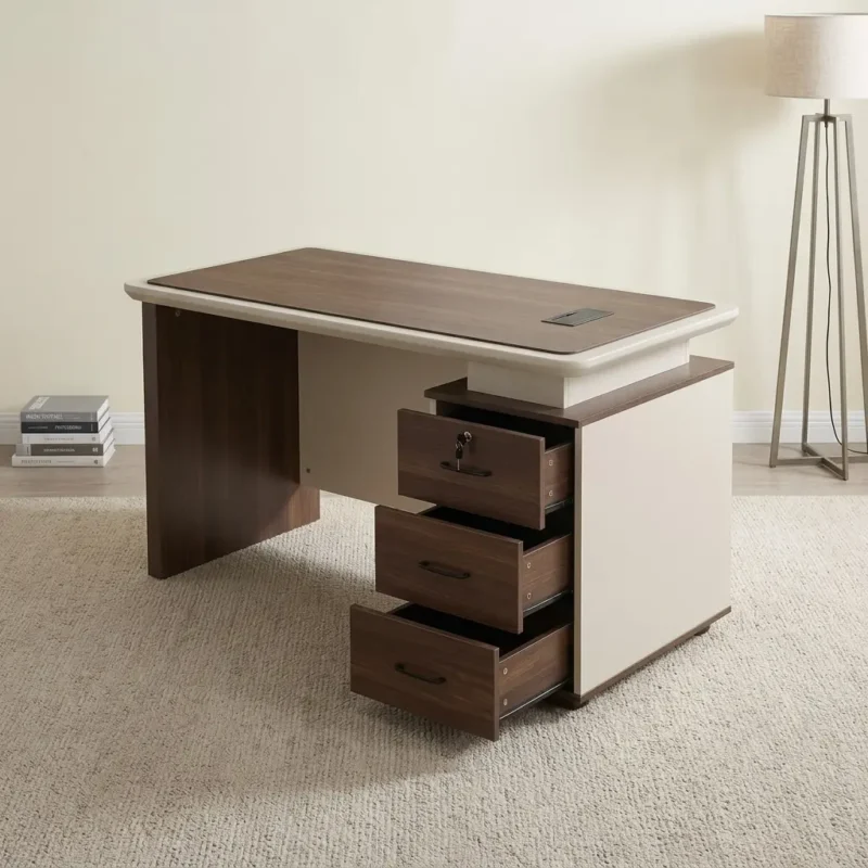 Executive 1200mm office table featuring a two-tone dark walnut and cream finish, a rectangular wood-grain desktop with a rounded beige border trim, an integrated cable management grommet, a cream modesty panel, and an integrated side storage pedestal with three lockable walnut-front drawers.