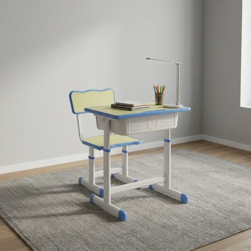 Adjustable kids desk & chair featuring a pastel blue and light yellow ergonomic set, height-adjustable white metal frames, an integrated under-desk storage drawer, a side bag hook, and rounded safety edges on both the table and seat.