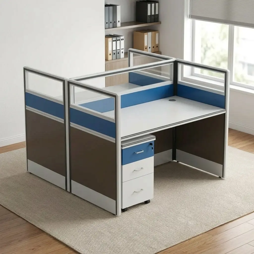 Modern 2-seater office workstation featuring face-to-face dual desk pods, integrated tri-color partition panels with clear top glass, blue fabric accent strips, dark grey privacy bases, built-in cable grommets, and two matching mobile lockable pedestal drawers.