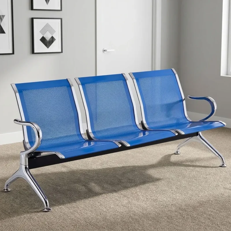 Blue 3-link waiting bench featuring three blue powder-coated perforated steel seats with chrome-bordered trims, fixed chrome loop armrests at each end, a heavy-duty black steel cross-beam support structure, and polished chrome Y-shaped legs with adjustable levelling feet.