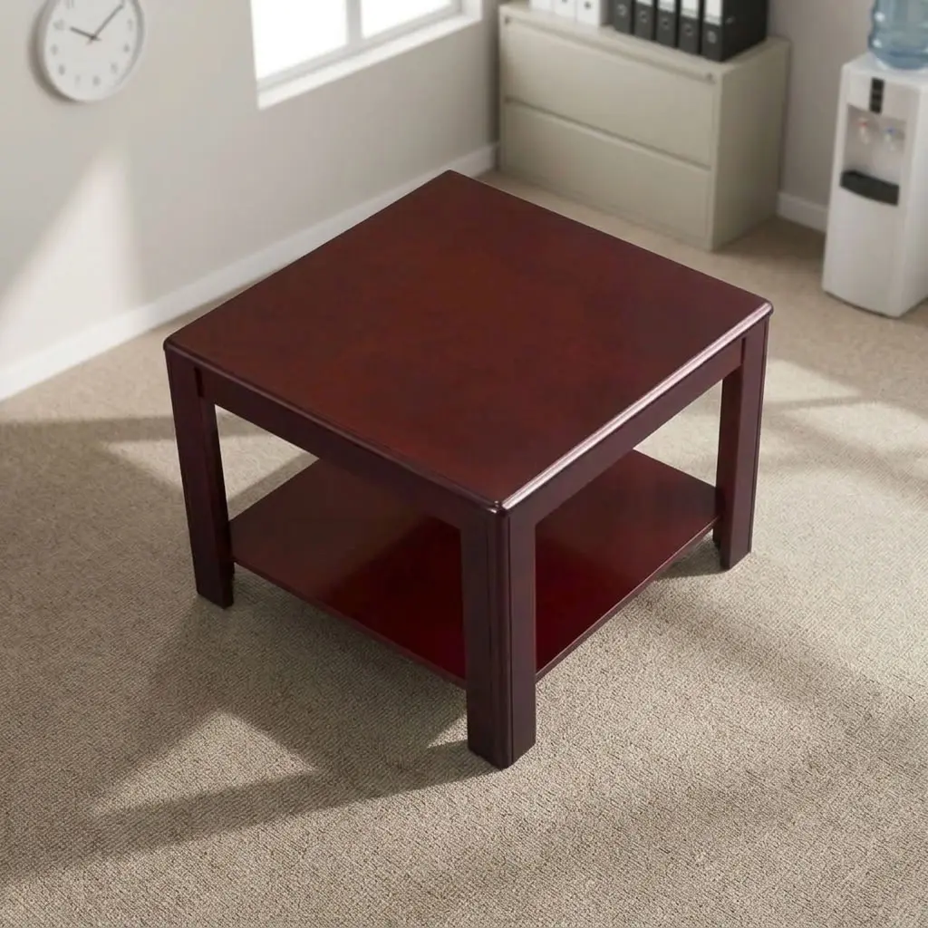 Square office coffee table featuring a dark mahogany wood-grain finish, a smooth square desktop with bevel-trimmed edges, an integrated full-length lower open display/storage shelf, and sturdy square solid wood legs.
