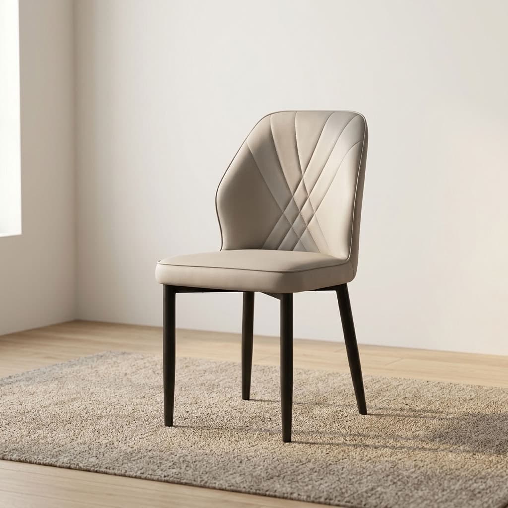 Modern leather dining chair featuring light gray faux leather upholstery with fan-style accent stitching on the inner backrest, a padded bucket-style seat with subtle side curves, an armless profile, and slim tapered black powder-coated metal legs.