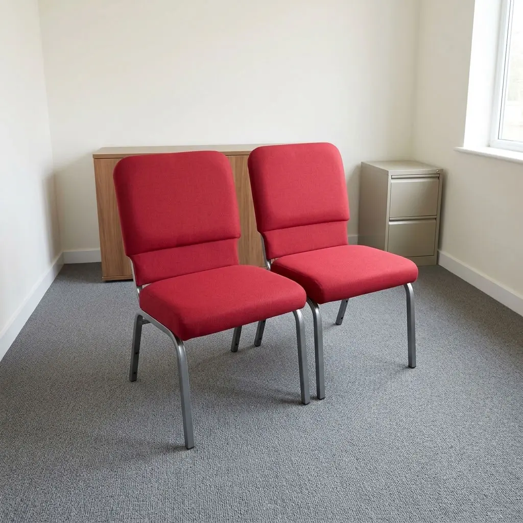 Commercial heavy duty church chair featuring vibrant red fabric upholstery with high-density padded backrest and seat cushions, armless stacking design, and a durable powder-coated silver-grey steel square tube frame base with plastic glides.