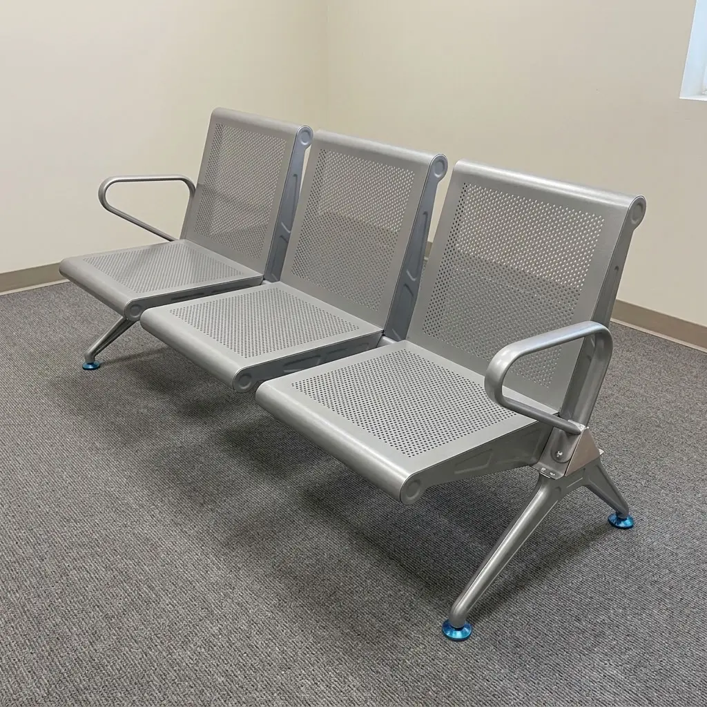 3 seater heavy duty waiting bench featuring three interconnected contoured seats with perforated silver-gray metal backrests and seat pans, outer side armrests, and a heavy-duty steel beam support structure with angled legs fitted with adjustable leveler floor glides.